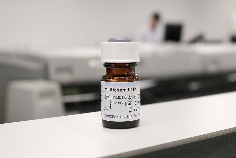 Multichem hsTn (High Sensitive Troponin) QC vial on a lab bench